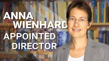 Portrait of Anna Wienhard with bookshelves in the background next to the text “Anna Wienhard – Appointed Director”