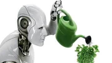 A robot watering a plant