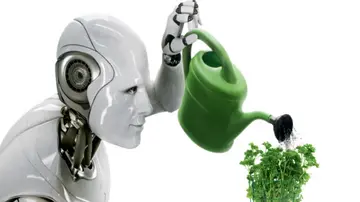 A robot watering a plant