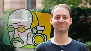 Portrait of Anton Ullrich outside in front of green plants and the Math Planck People logo