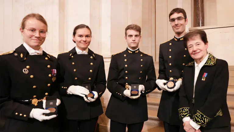 Five people in uniform with the Louis-Édouard Rivot medal