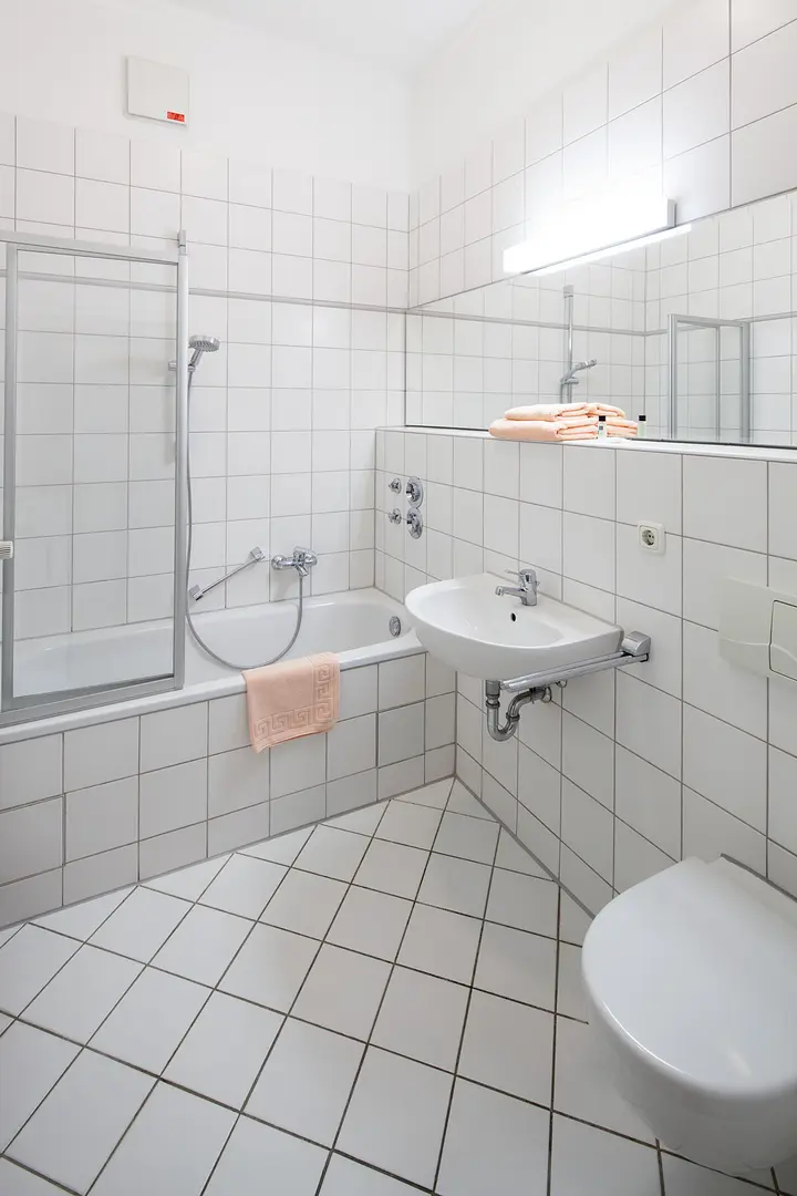 Bathroom with bathtub, sink and toilet