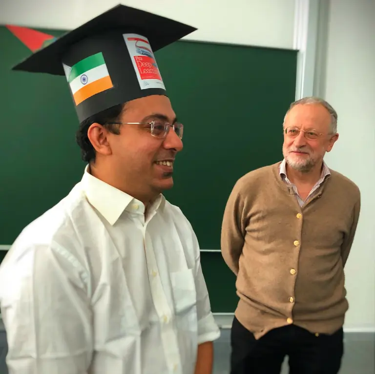 Pradeep Banerjee with his doctoral hat next to Jürgen Jost