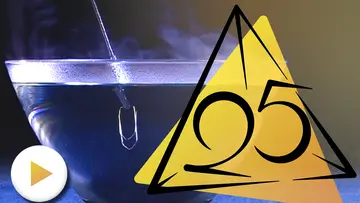 Video of a shape memory alloy paperclip restoring its shape in hot water